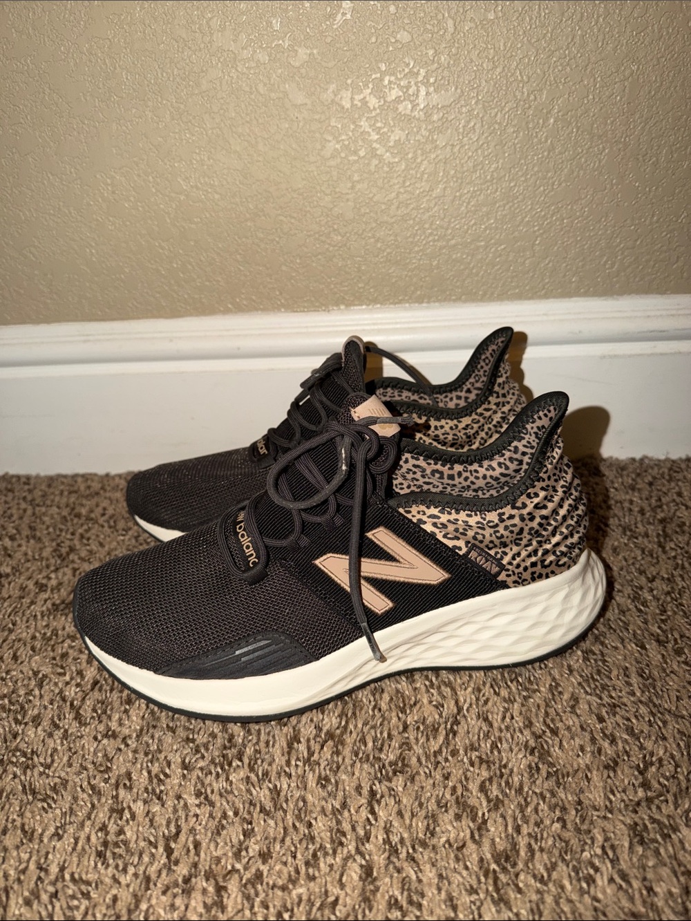 New Balance Women’s Black and Tan Leopard Accent Sneakers